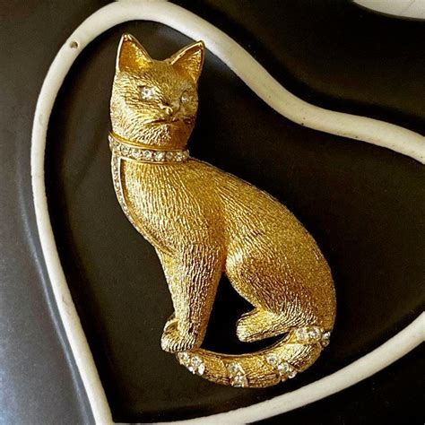 christian dior cat brooch|dior purse charms.